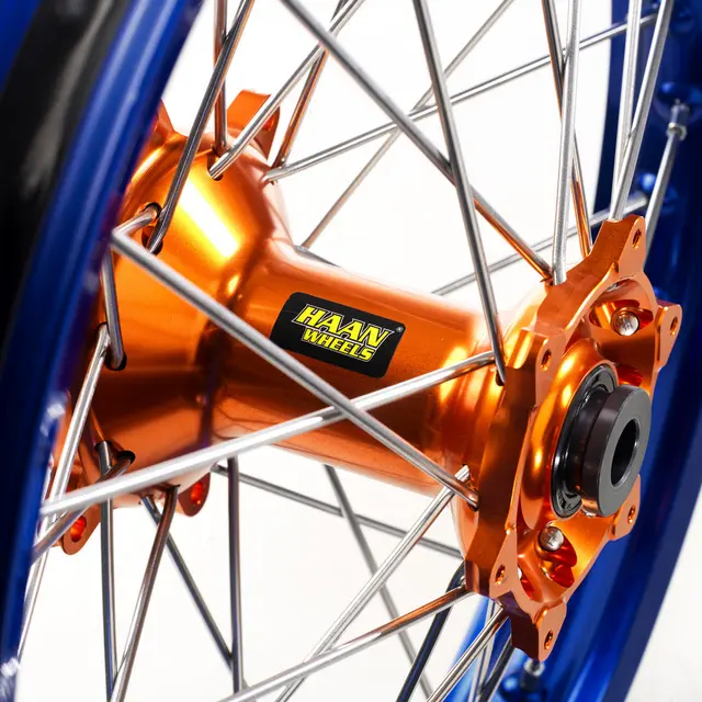 Haan Framhjul 17x3,50 - KTM/HQ - 22mm Blå Ring,Oransje Nav/Nipp,Sorte Eiker 