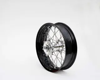 REX 18x2,15 KTM Bakhjul - 20mm aksel Sort Felgring m/ S&#248;lv Nav EXC 95-&gt;