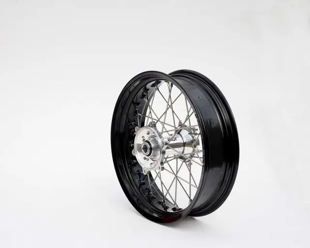 REX 18x2,15 KTM Bakhjul - 20mm aksel Sort Felgring m/ Sølv Nav EXC 95-> 
