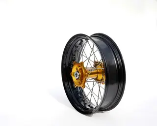 REX 17x4.50 Suzuki Bakhjul - 25mm aksel RMZ250,RMZ450 07-&gt;  Sort Ring, Gull Nav